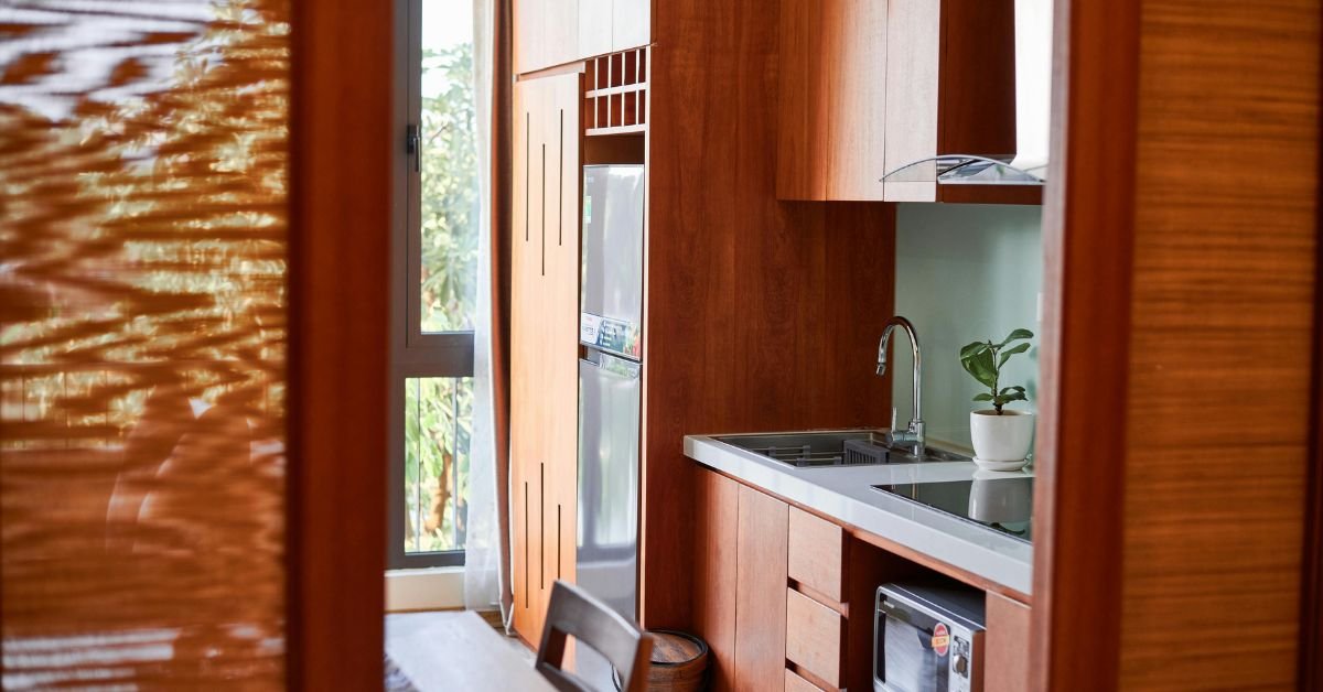 Red wood kitchen cabinets with a rich, warm finish