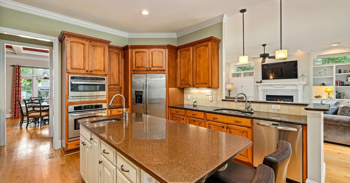 Rustic wood kitchen cabinets with distressed finishes and natural knots.