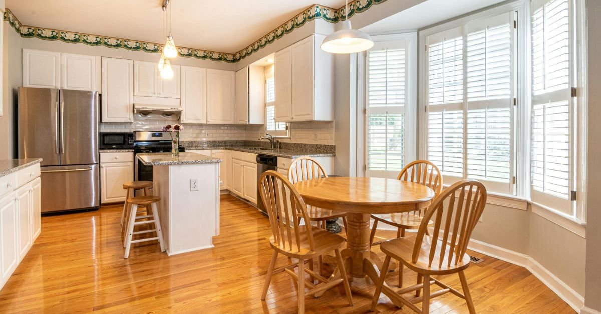 Cohesive kitchen with walnut furniture.