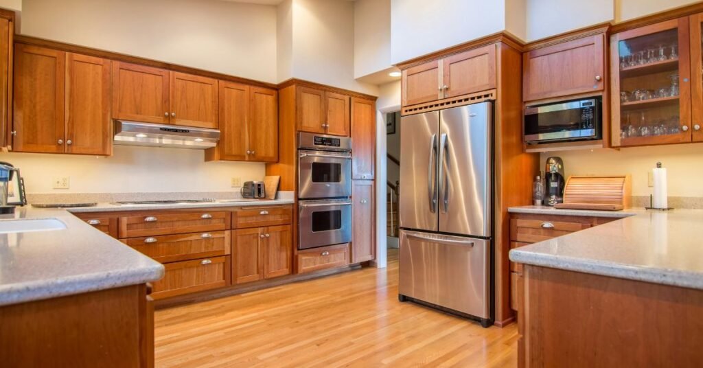 Walnut kitchen cabinets featuring rich, dark wood grain and luxurious finish